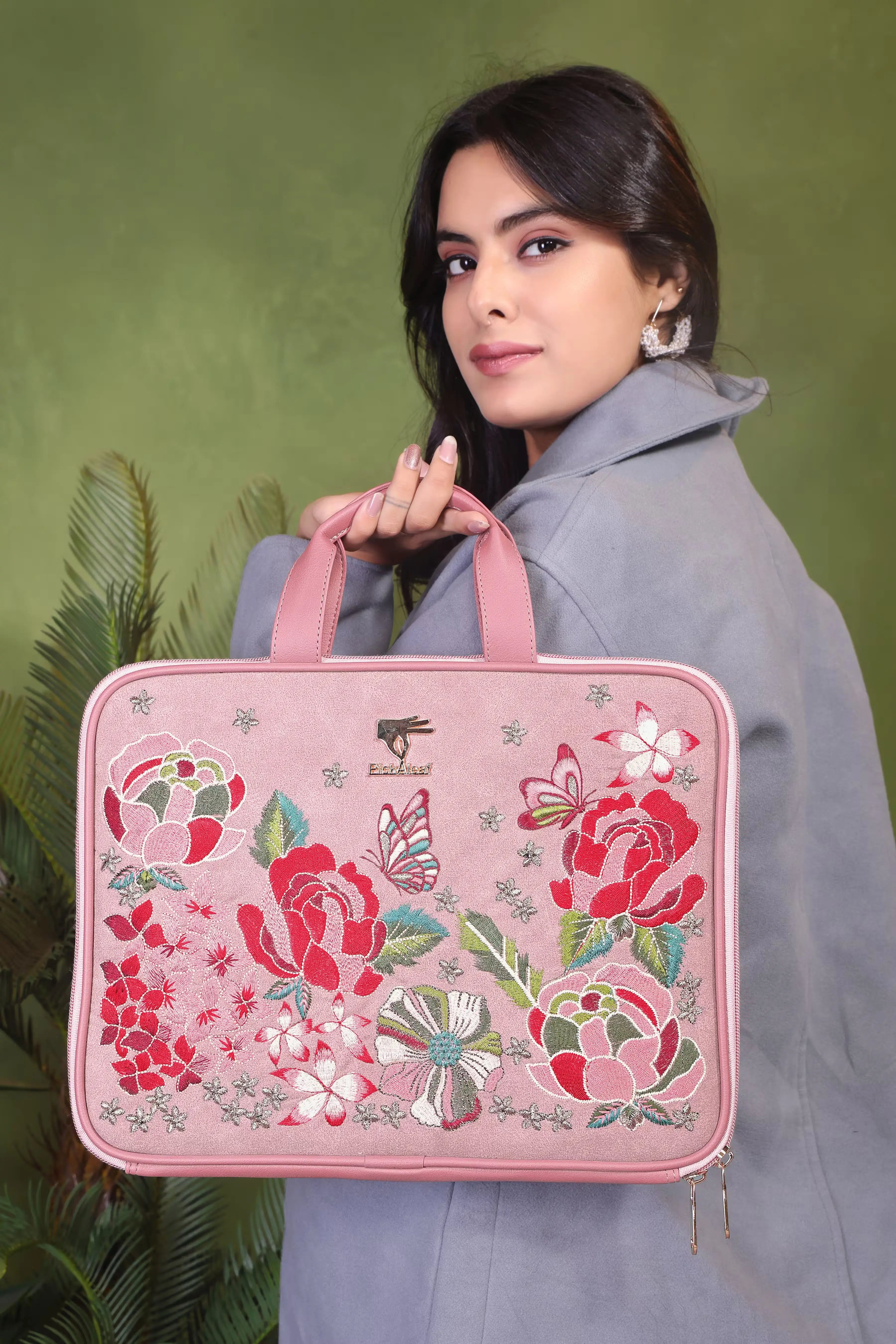 Pink Petal Eden embroidered laptop sleeve.