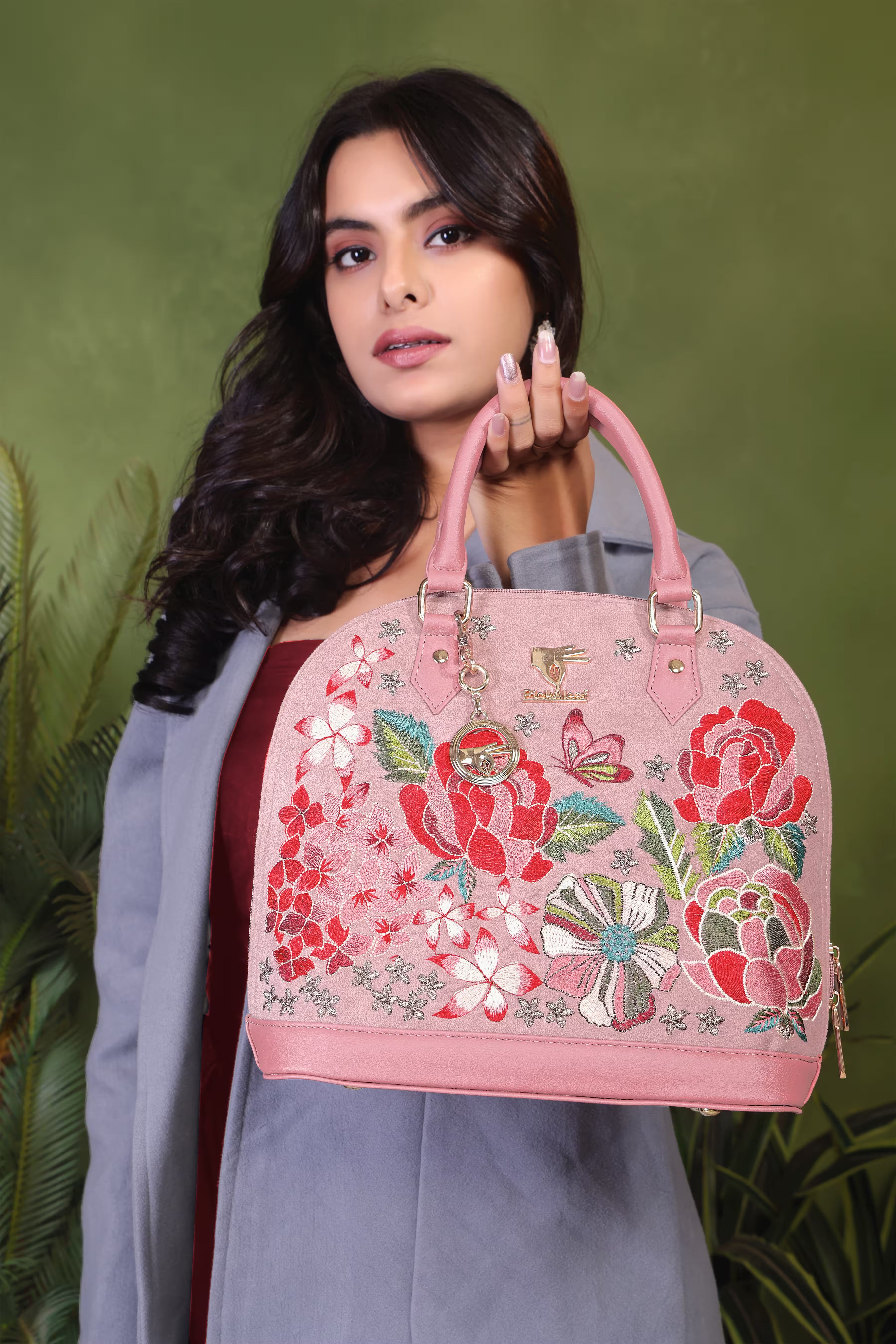 Pink Petal Eden embroidered handbag.