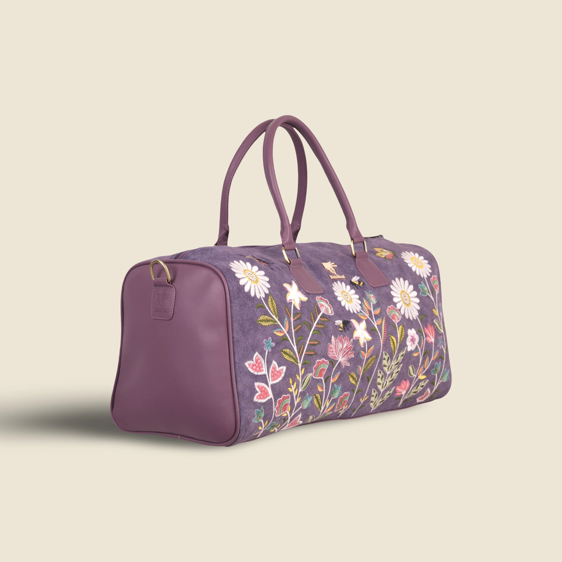 Purple travel duffel bag in cruelty free vegan leather by PickAleaf with embroidered design for cabin travel and weekend trips