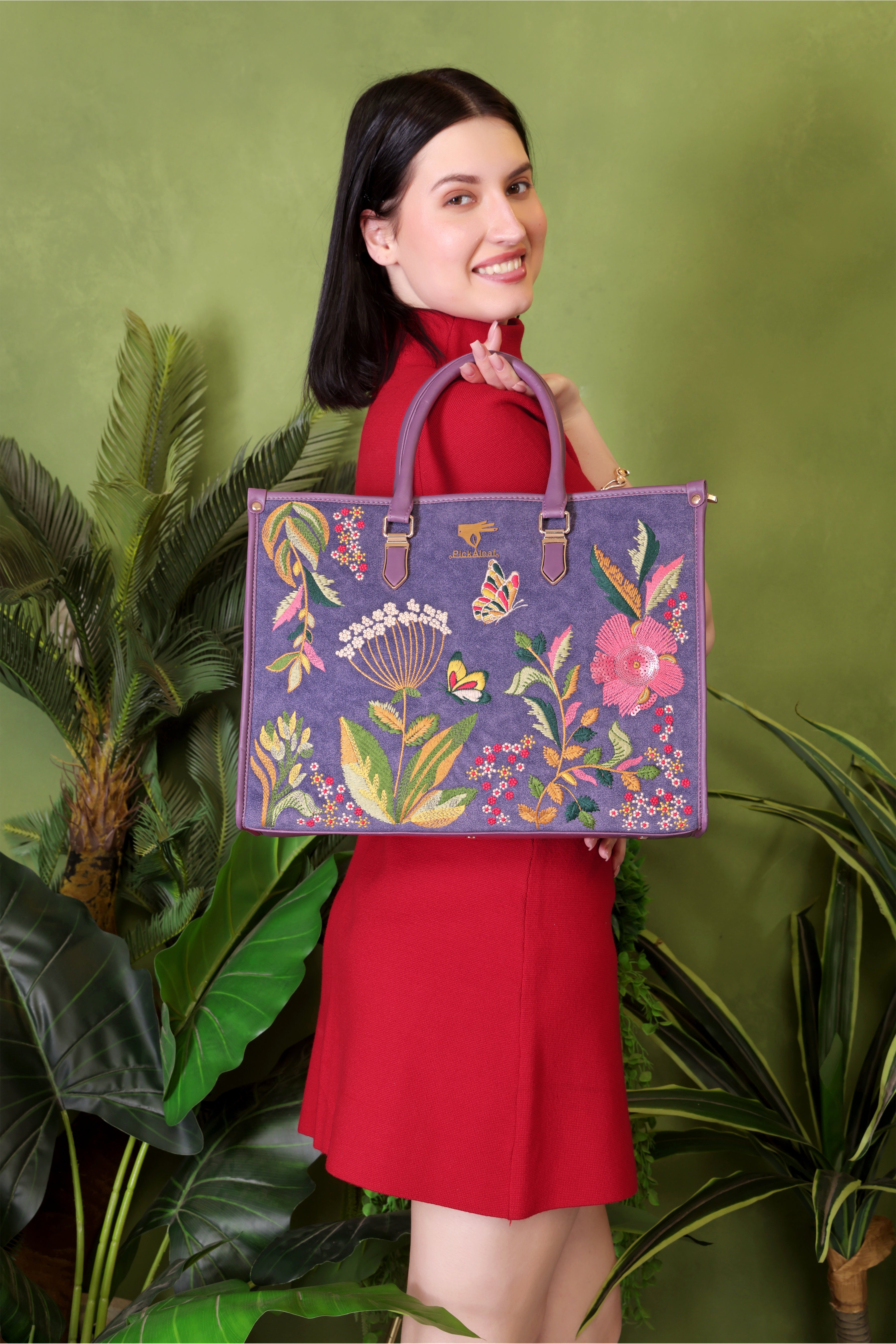 Purple Violet Valley embroidered shoulder bag.