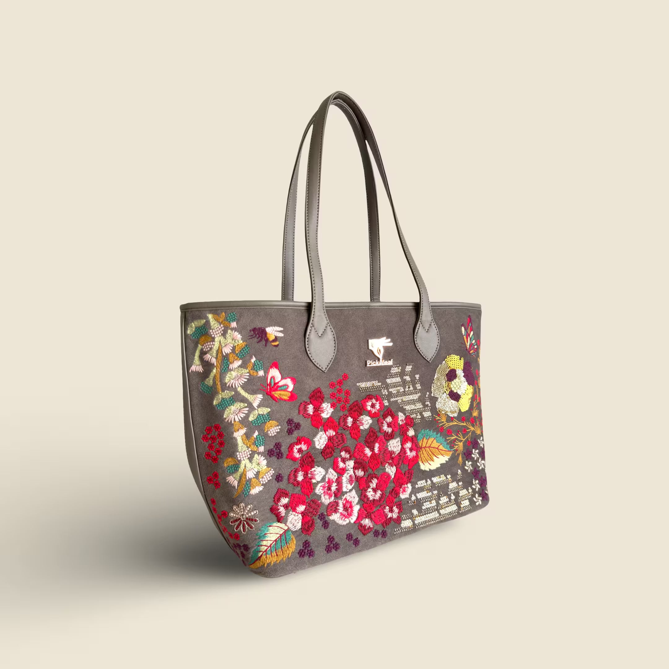 Grey laptop tote bag for women in vegan leather embroidery by PickAleaf with structured design for office, travel and daily use
