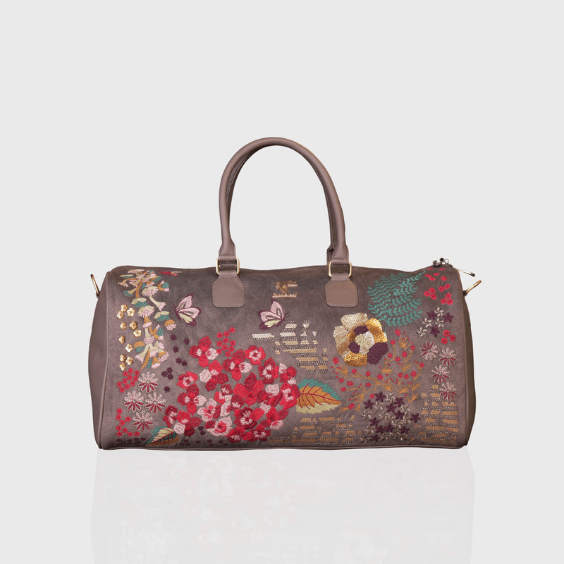 "Grey Garden embroidered duffel bag."