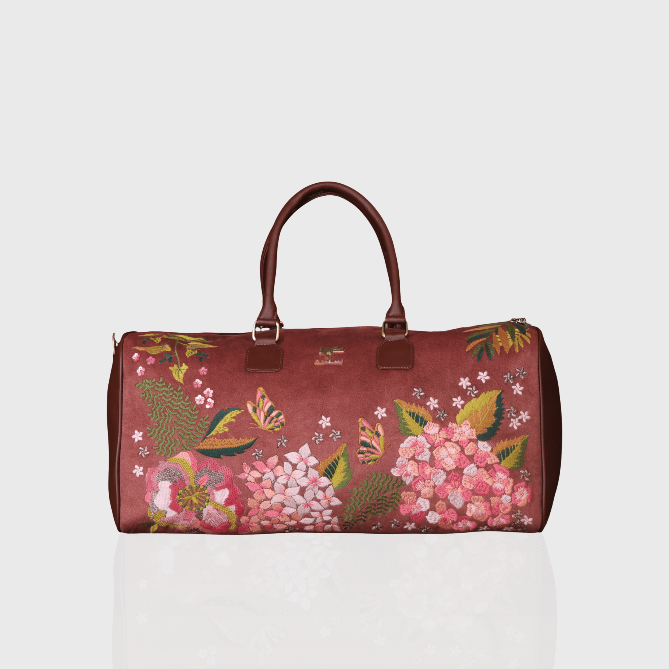 Brown Blossom Wood embroidered duffel bag.