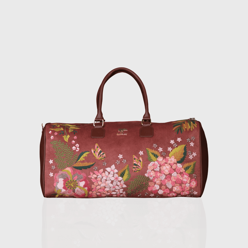 Brown Blossom Wood embroidered duffel bag.