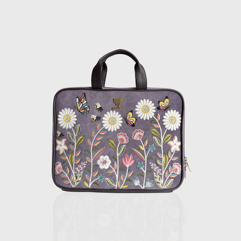 Purple Daisy Dream embroidered laptop sleeve.