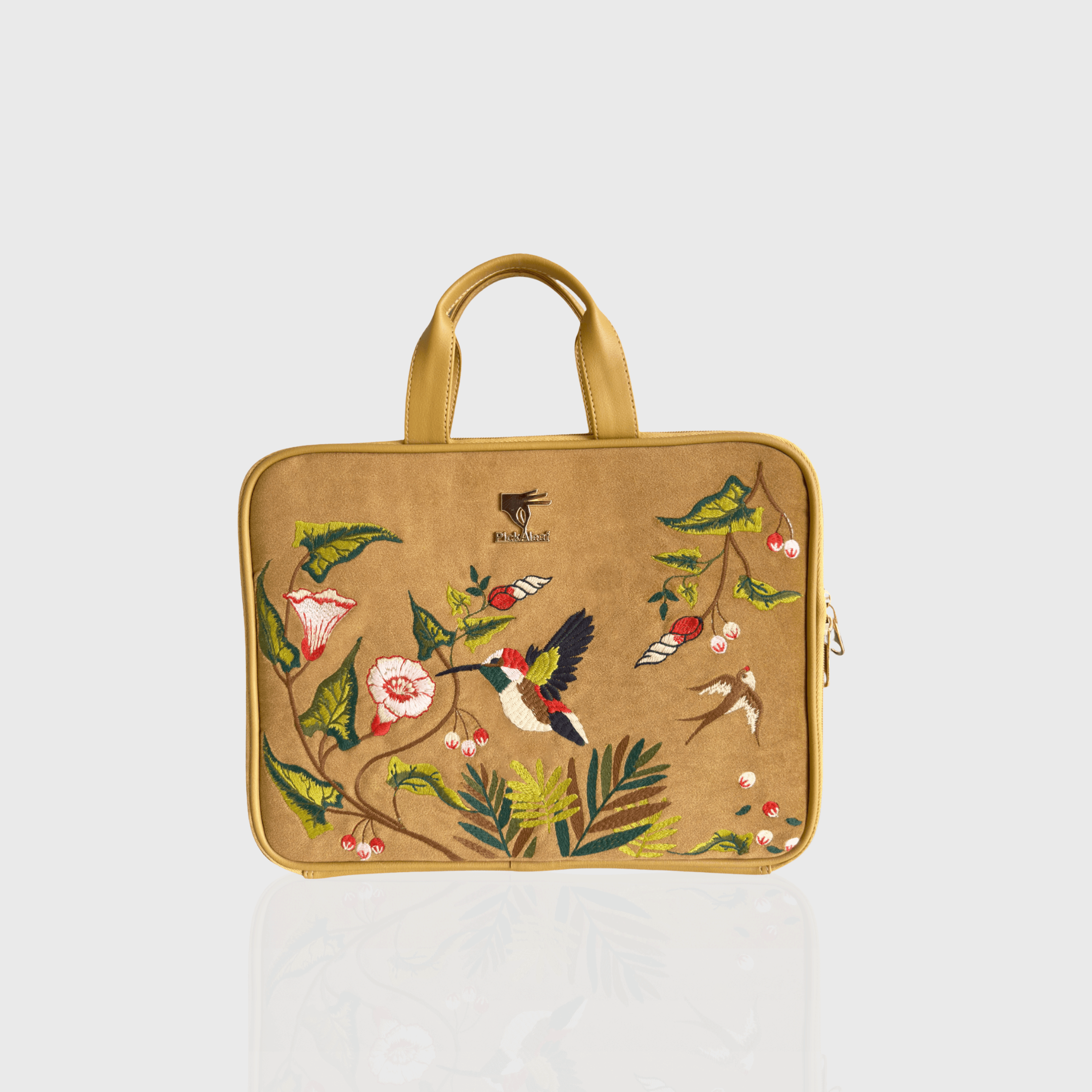 Gold Flora embroidered laptop sleeve.