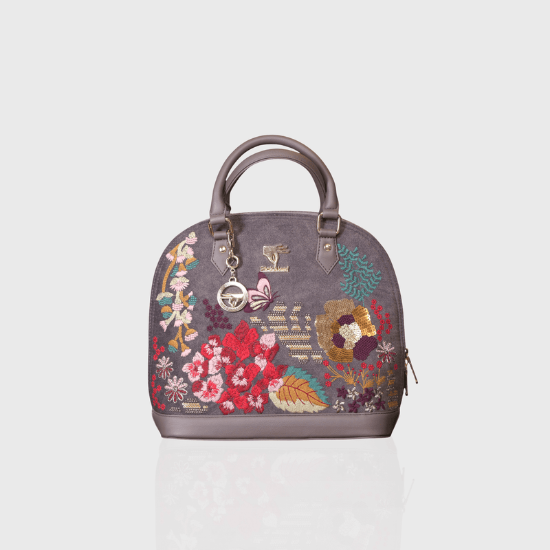 Grey Garden embroidered handbag.