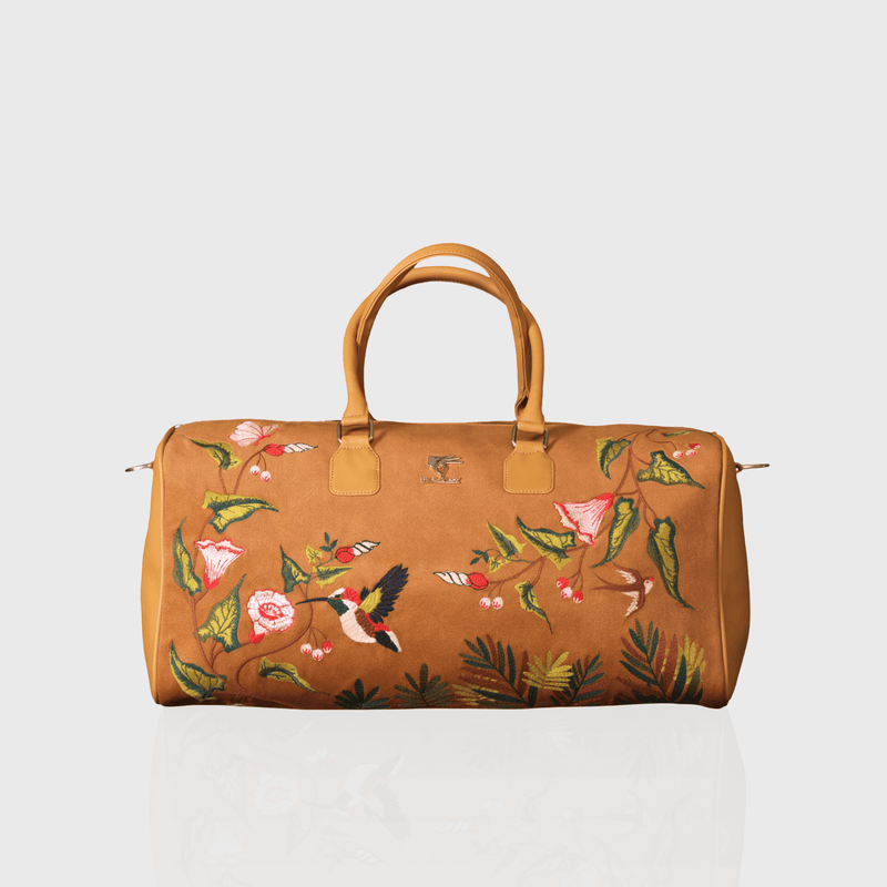 Gold Flora embroidered duffel bag.