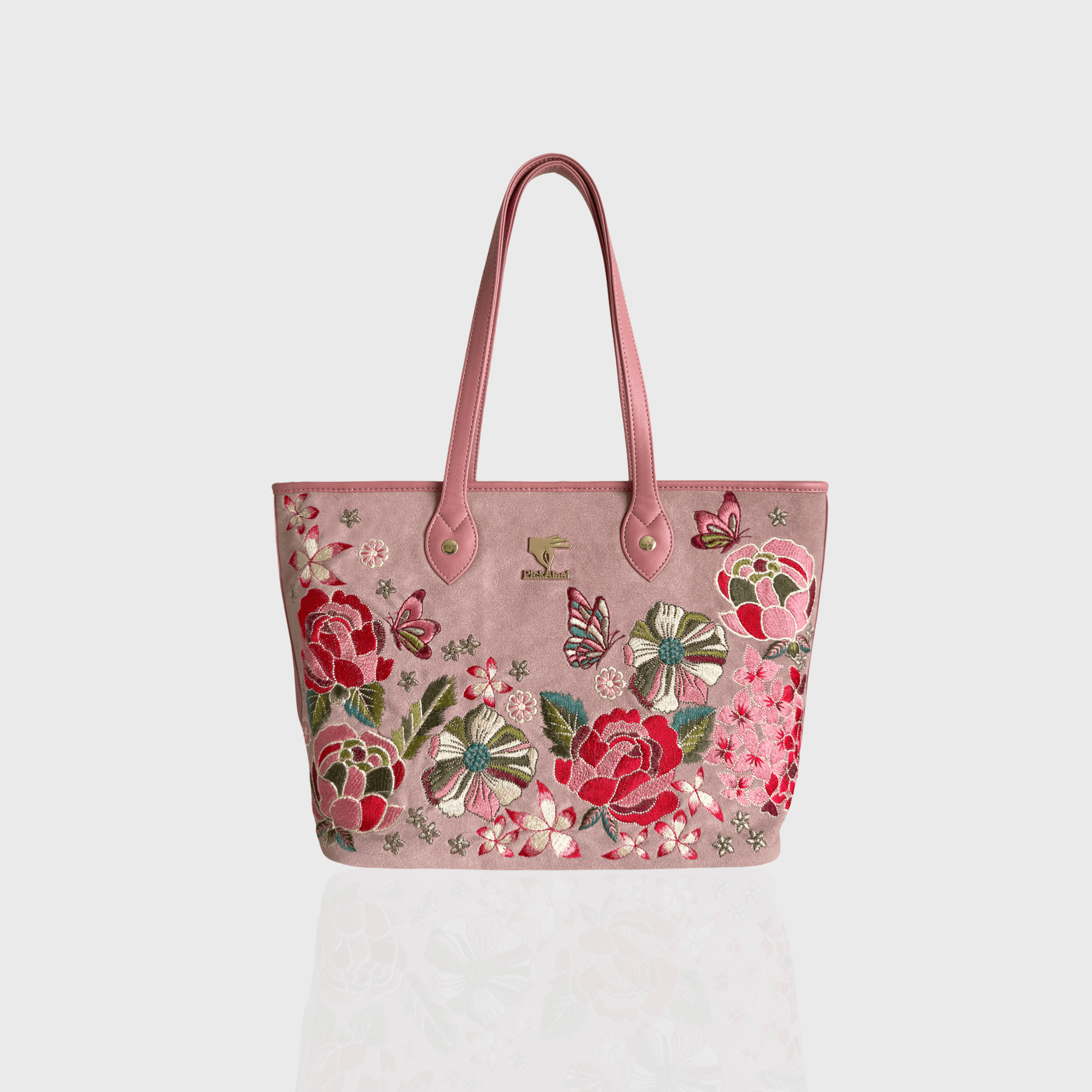 Pink vegan leather tote bag with Petal Eden floral embroidery