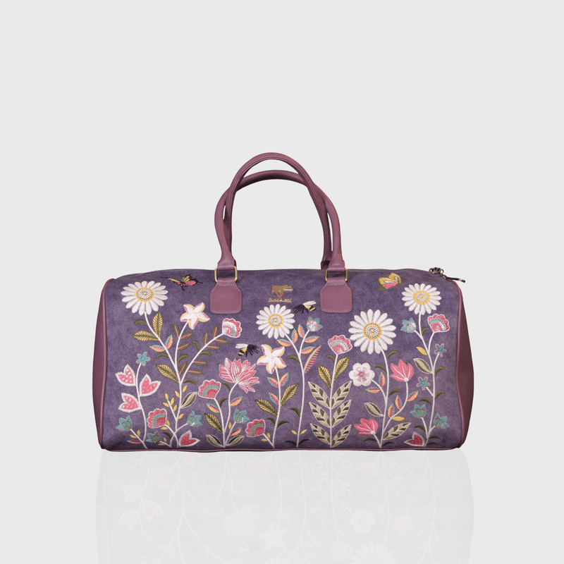 Purple Daisy Dream embroidered duffel bag.