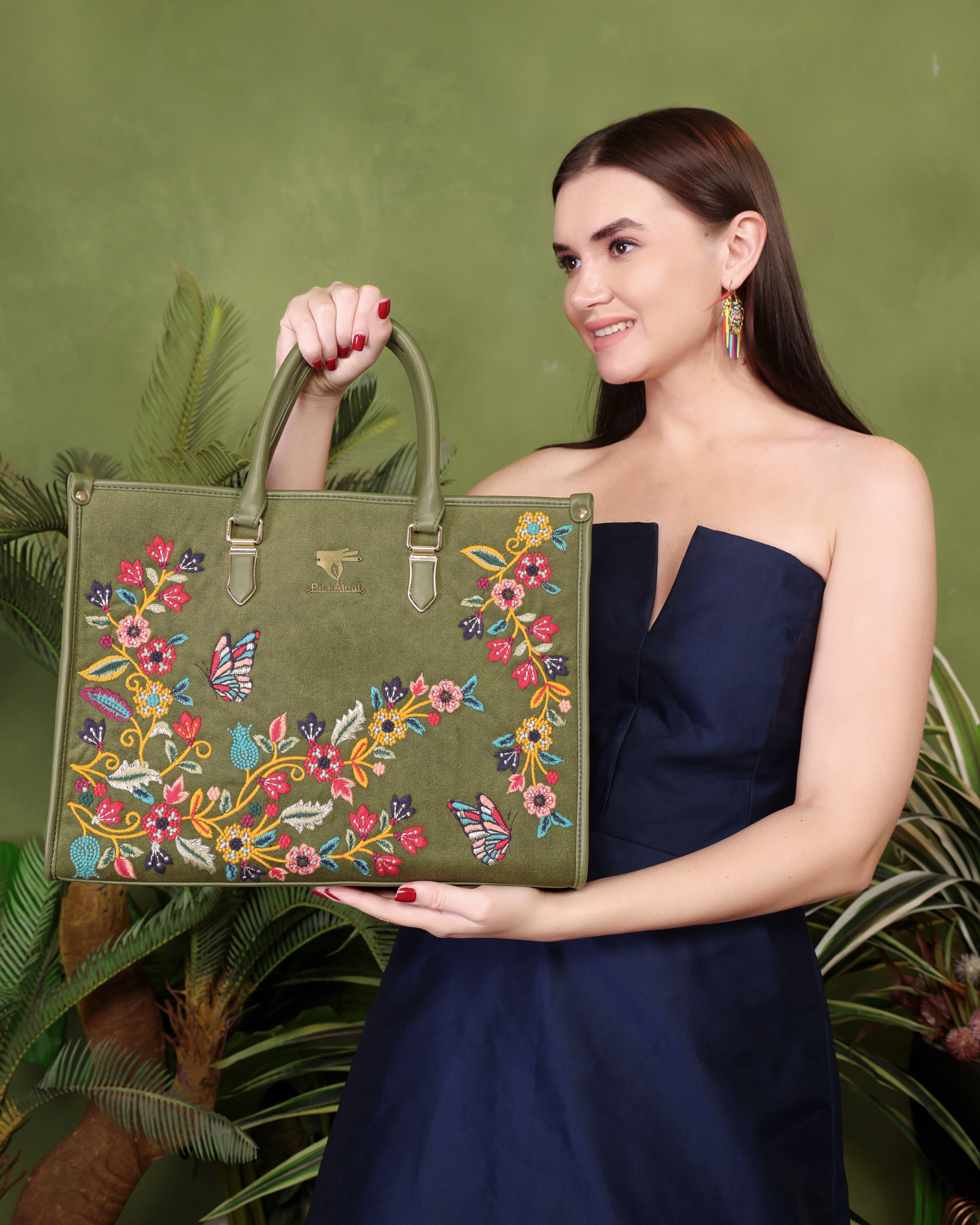 Olive green Waves embroidered shoulder bag.