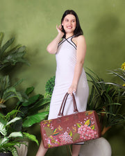 Brown travel luggage duffel bag for women in cruelty free vegan leather by PickAleaf for cabin travel and weekend trips