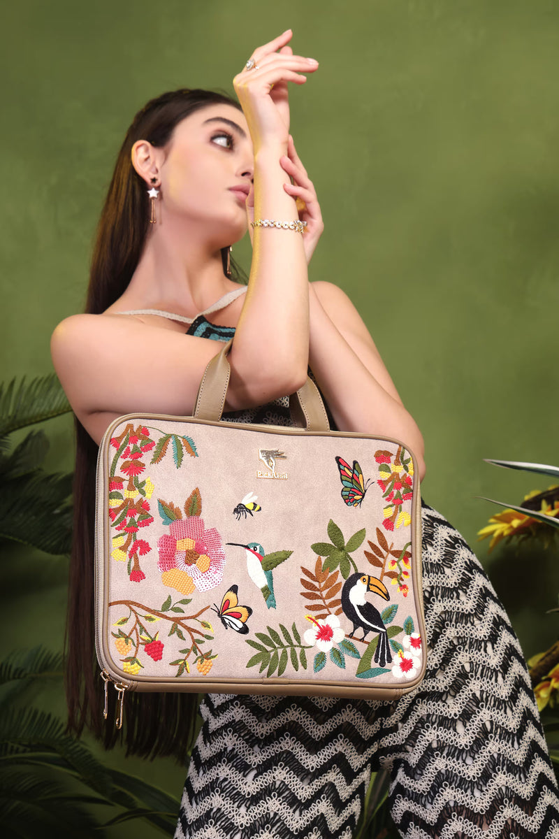 Beige suede velvet laptop sleeve with premium soft texture.