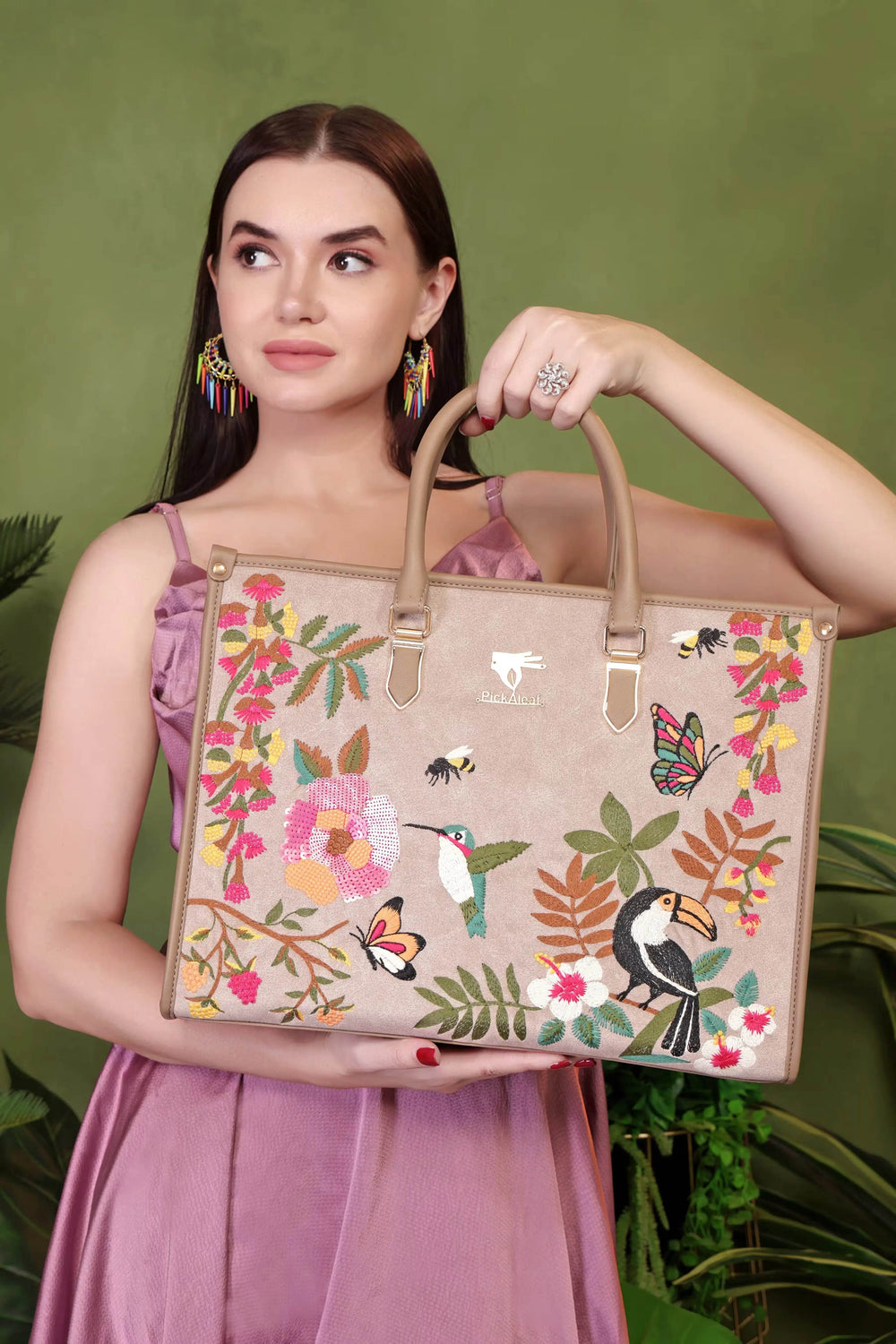Beige party tote bag for women in cruelty free vegan leather by PickAleaf with embroidered design for outings and special occasions