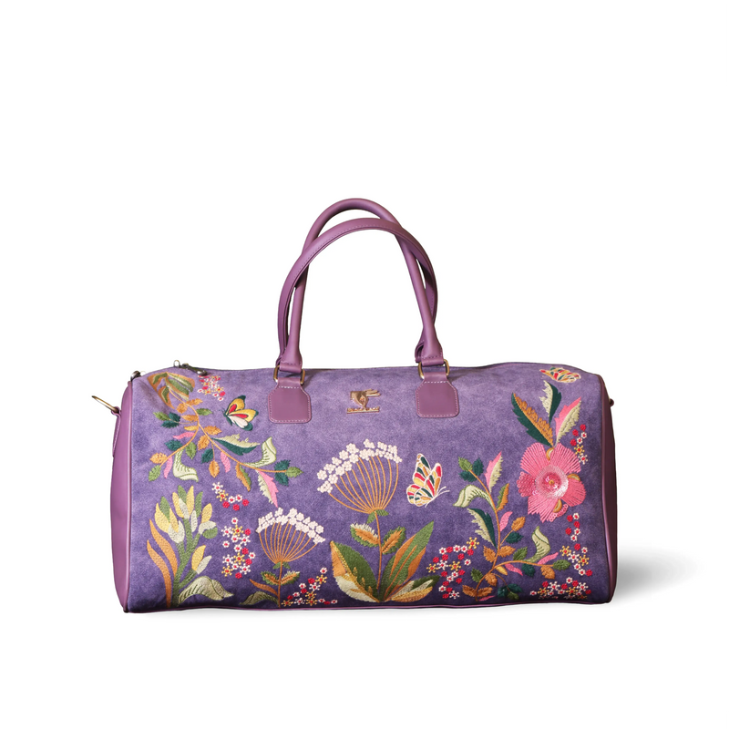 Purple airport travel duffel bag for women in cruelty free vegan leather by PickAleaf for cabin travel and carry on use