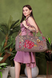 Grey overnight duffel bag for women in cruelty free vegan leather by PickAleaf for short trips and cabin travel use