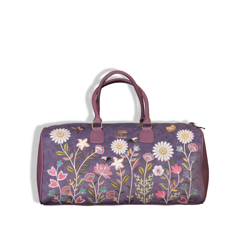 Purple travel duffel bag in cruelty free vegan leather by PickAleaf with embroidered design for cabin travel and weekend trips