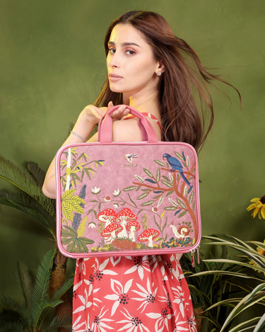 Pink Paradise embroidered laptop sleeve.
