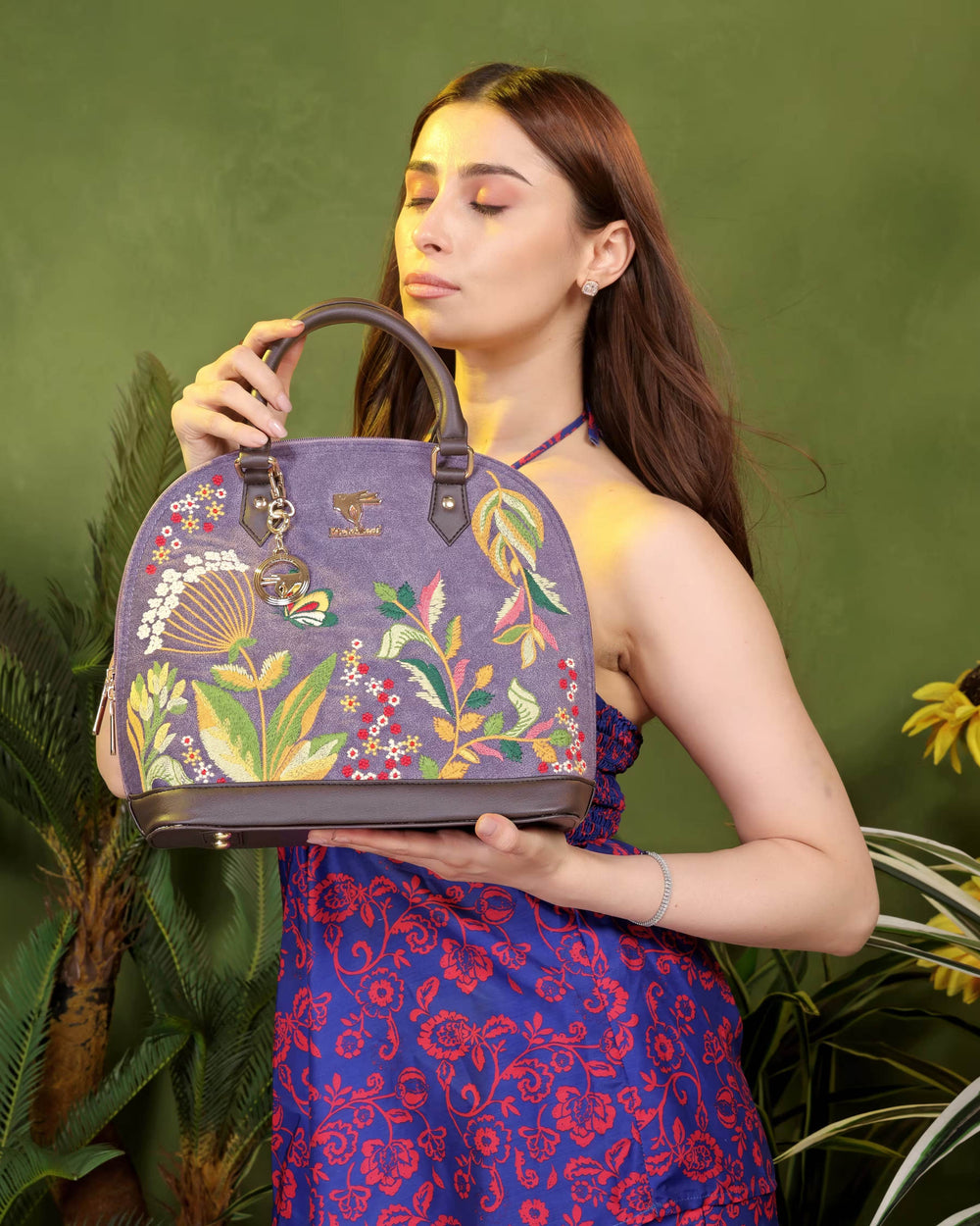 Purple embroidered top handle bag for women in vegan leather by PickAleaf, cruelty free with floral design for weddings and parties