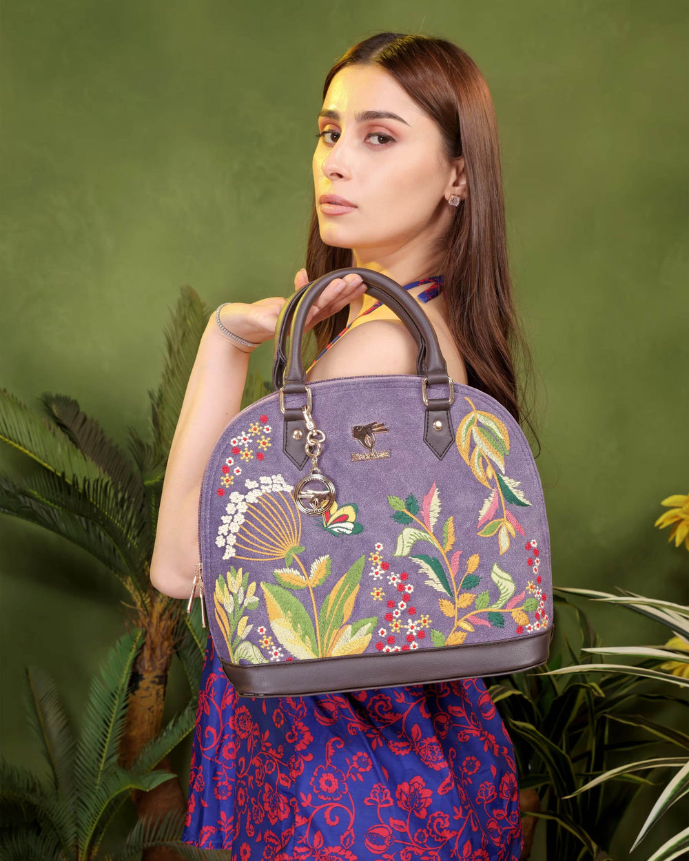 Purple embroidered top handle bag for women in vegan leather by PickAleaf, cruelty free with floral design for weddings and parties