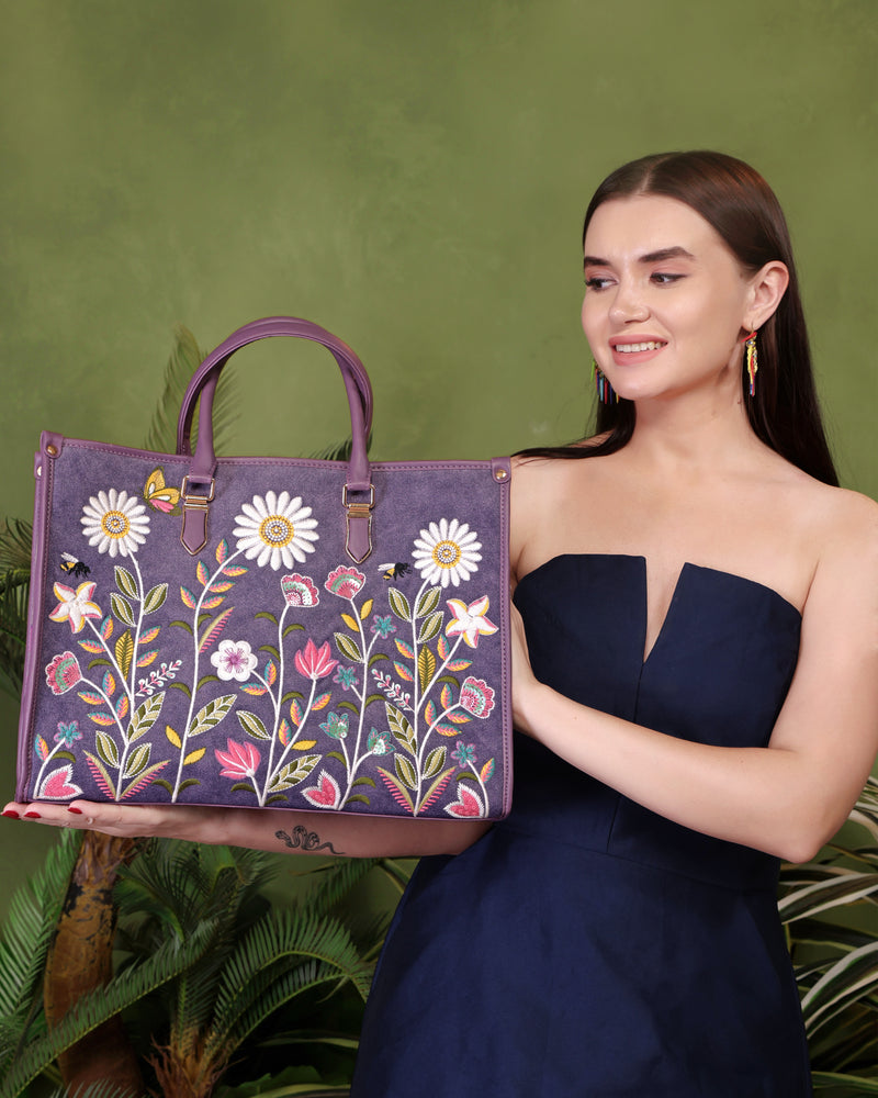 Purple Daisy Dream embroidered shoulder bag.