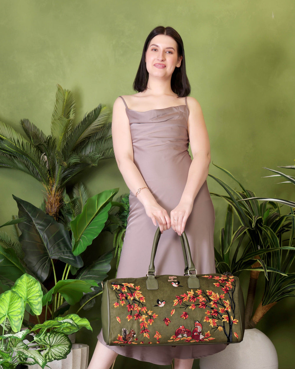 Olive green large travel duffel bag for women in cruelty free vegan leather by PickAleaf for weekend and cabin travel use