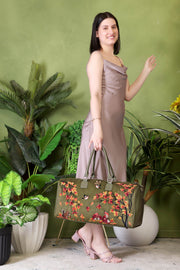 Olive green large travel duffel bag for women in cruelty free vegan leather by PickAleaf for weekend and cabin travel use