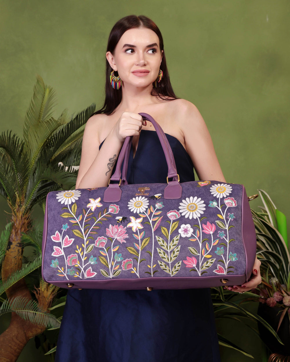 Purple travel duffel bag in cruelty free vegan leather by PickAleaf with embroidered design for cabin travel and weekend trips