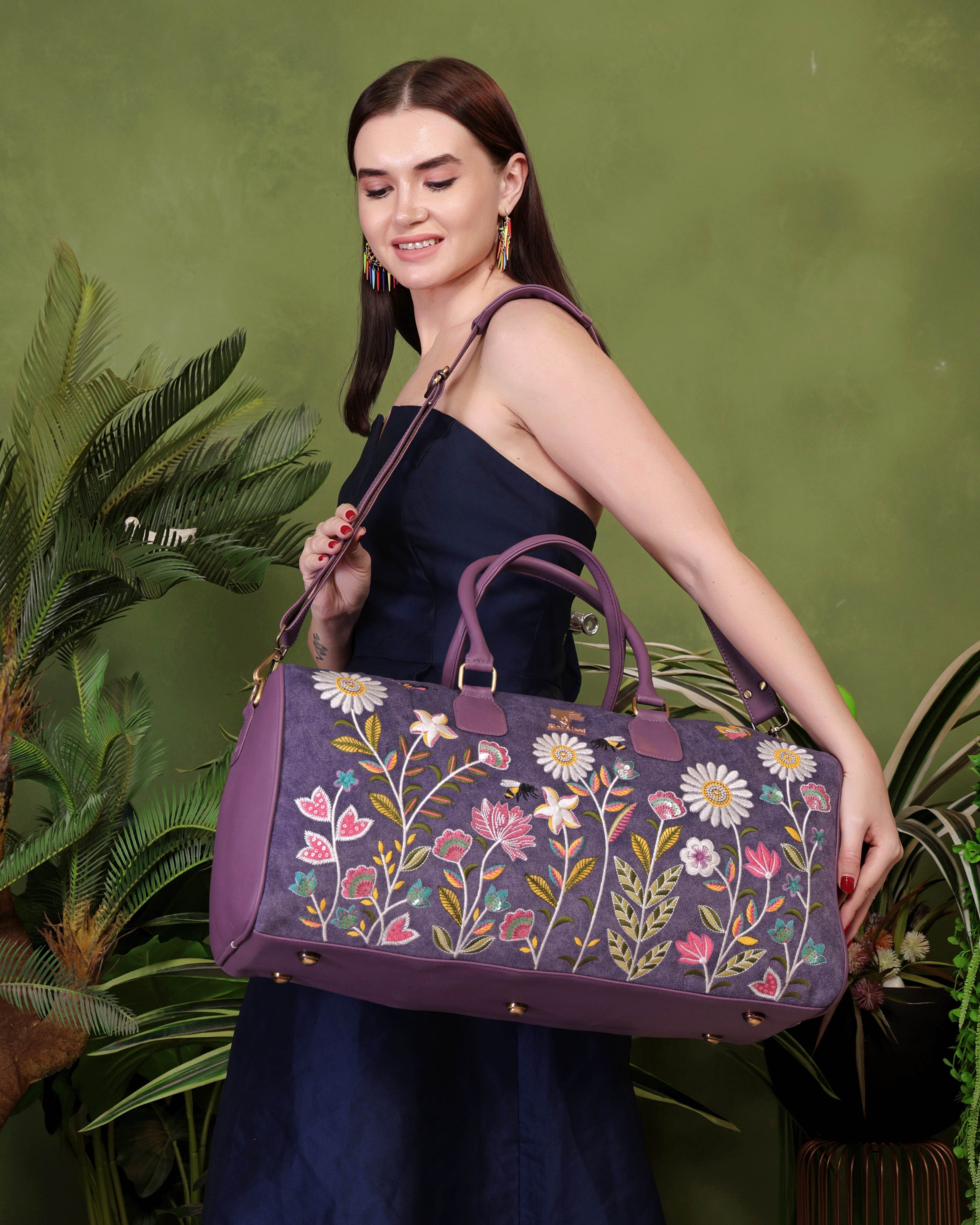 Purple travel duffel bag in cruelty free vegan leather by PickAleaf with embroidered design for cabin travel and weekend trips