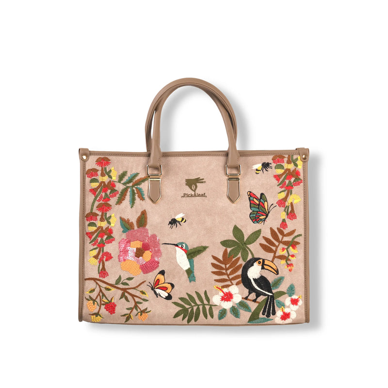 Beige party tote bag for women in cruelty free vegan leather by PickAleaf with embroidered design for outings and special occasions
