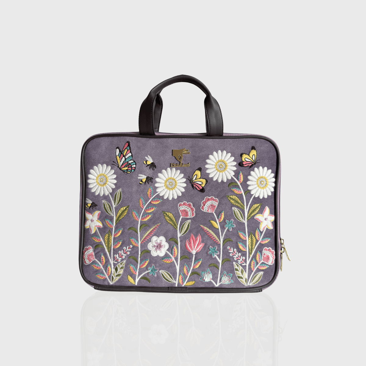 Purple Daisy Dream embroidered laptop sleeve.