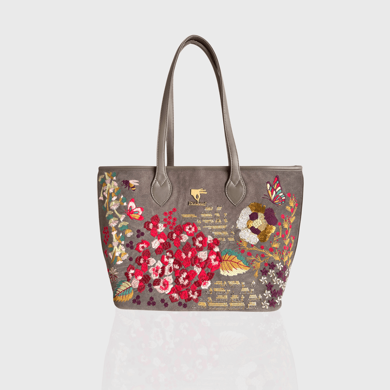 Grey vegan leather embroidered tote bag.