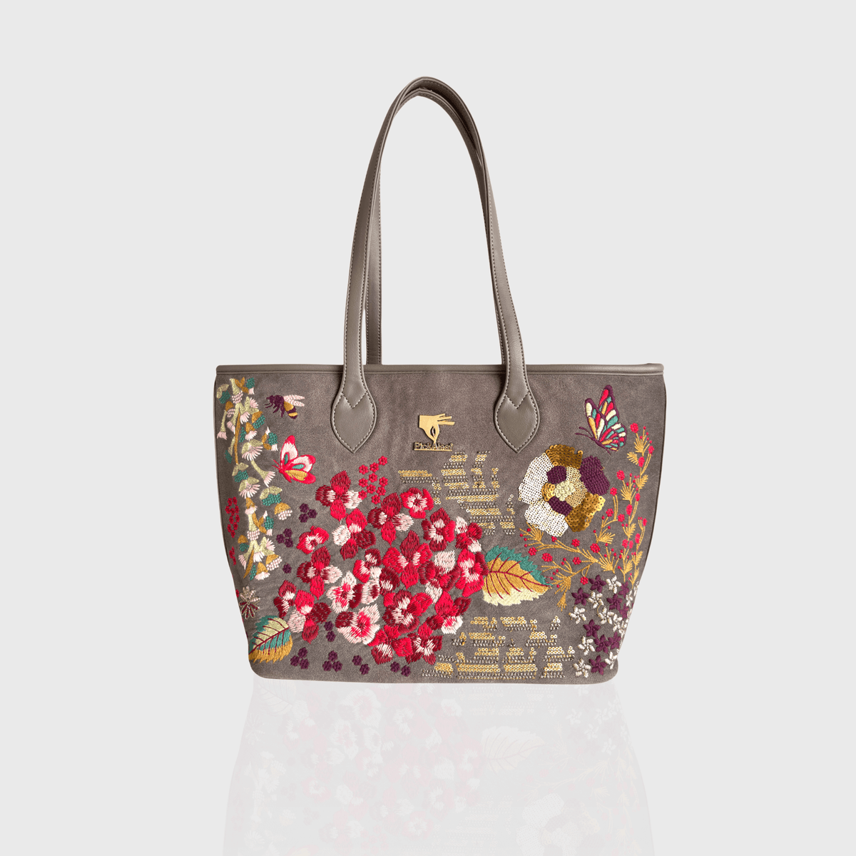 Grey vegan leather embroidered tote bag.