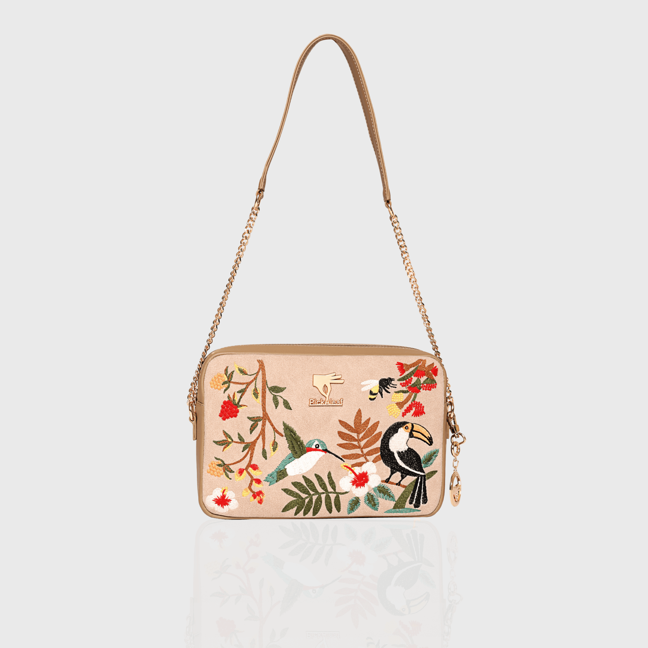 Mystic Garden embroidered beige sling bag in special edition vegan leather.