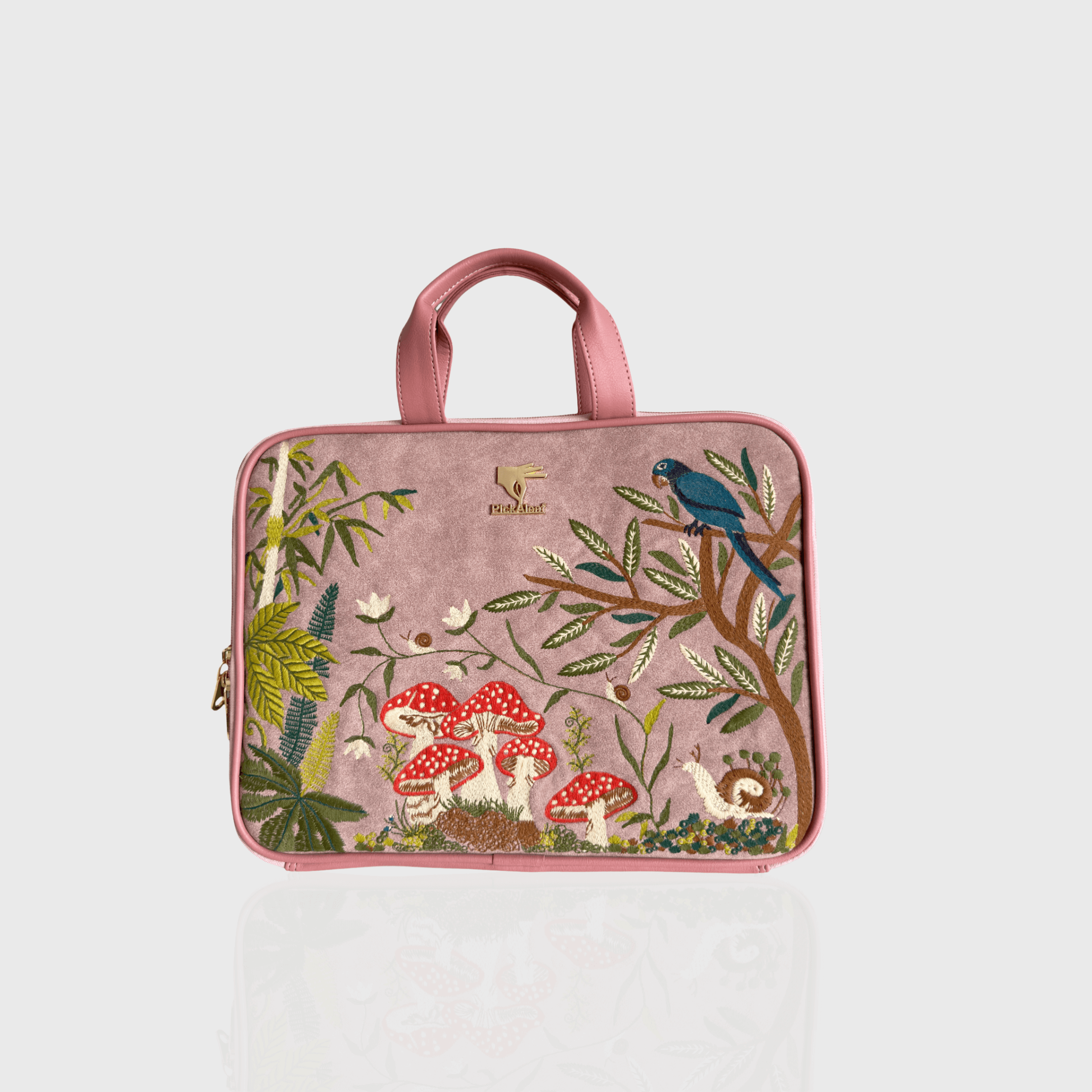 Pink Paradise embroidered laptop sleeve.