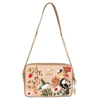 Mystic Garden Crossbody Bag by PickALeaf in beige vegan leather, with a gold-tone chain strap and tropical toucan, hummingbird and floral embroidery.